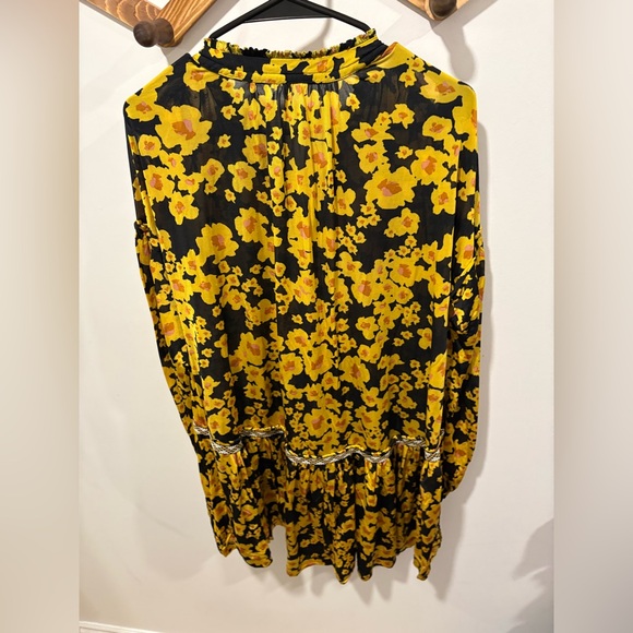 Free People Love Letter Floral Tunic Blouse in a black and yellow floral print. - Picture 11 of 11